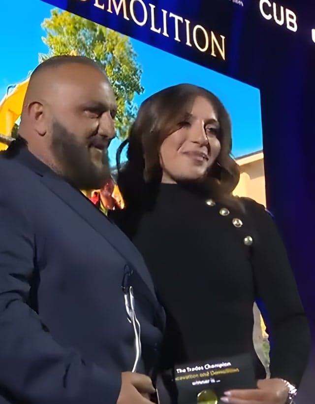 Zac and Janette on stage at the 2023 Australian Trades Small Business Champion Awards